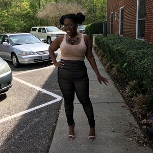 Black and cream jumpsuit. Cute with a belt. Med